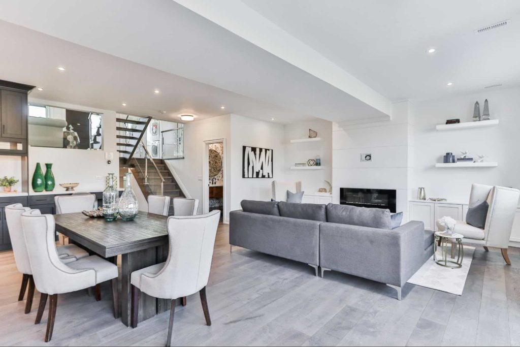 Living room and dining room with contemporary interior design.