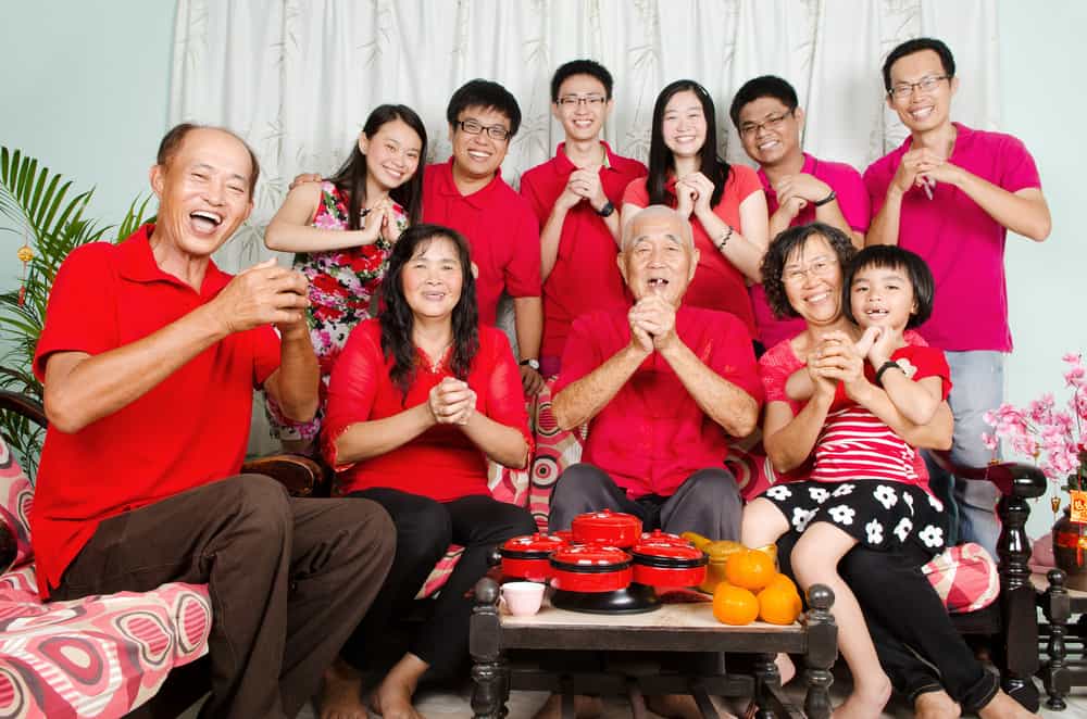 Malaysians shop for new clothes and wear red clothes for good luck