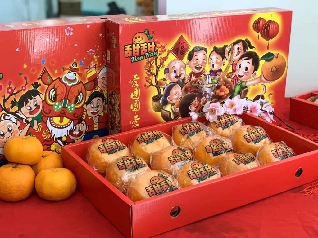 Oranges and ang paos are exchanged