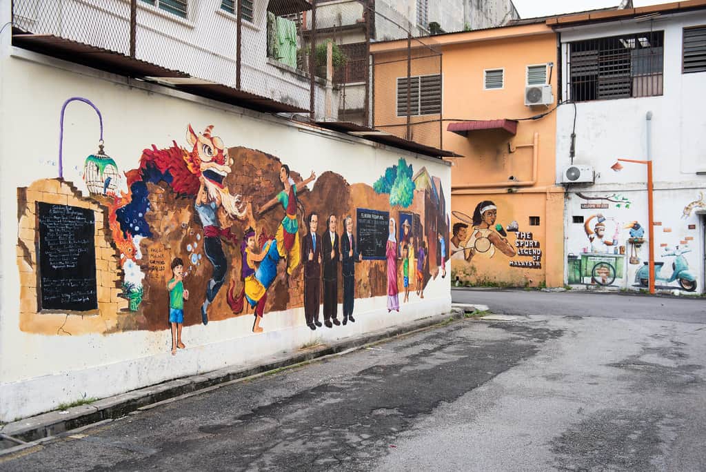 Admire beautiful street art on the Mural’s Art’s Lane